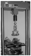 Biomechanics Figure 2-7: Photograph depicting a typical bench-top knee simulator in the assessment of TKR passive constraint (Stryker Orthopaedics; Mahwah, NJ).