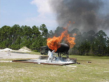 Figure 2.1.4: UHP attacking a 4 gpm continuously running fuel fire from an engine nacelle. figure 2.1.4