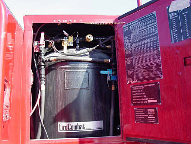 Figure 3.6.1: The 500 lb dry chemical storage tank located behind the passenger’s side cab. figure 3.6.1