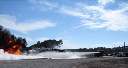 Figure 4.6.5: The UHP P-19 extinguishing a 3500 foot JP-8 fuel fire using UHP bumper turret nozzle #2. figure 4.6.5