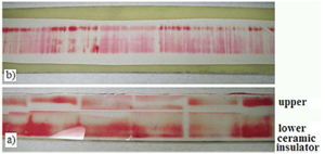 Fig. 2. High Pressurex® film between the (a) upper G-10 insulator and steel containment and (b) primary and augmenting rails.